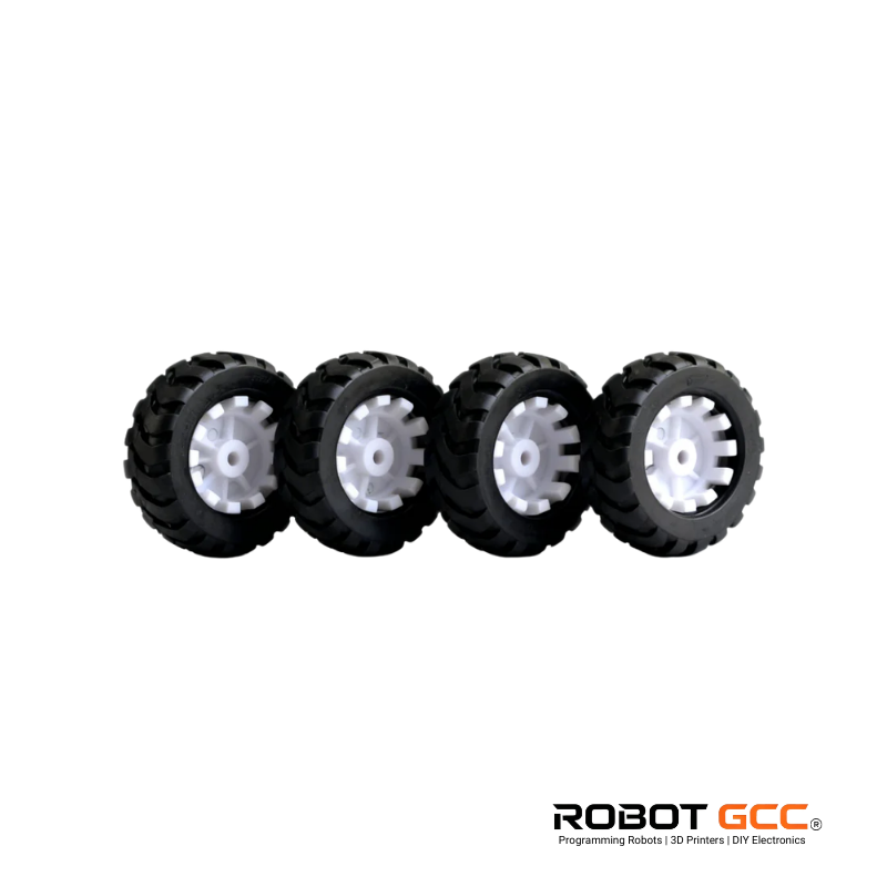 Four black wheels with white spikes on a white background, featuring the ROBOT GCC logo.