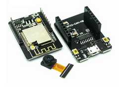 Two electronic circuit boards with a camera module on a white background