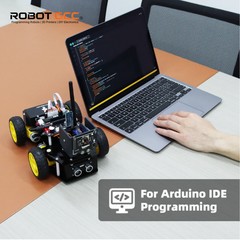 Laptop with Arduino robot on a desk, featuring ROBOT GCC branding.
