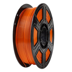 Spool of orange filament on a white background