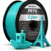 Spool of brown 3D printing filament with models made from it on a white background