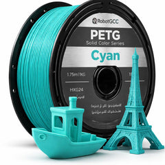 Spool of brown 3D printing filament with models made from it on a white background