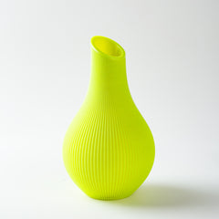 Green textured vase on a white background