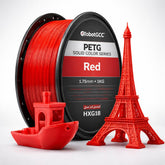 Red 3D printing filament spool with small red models of a boat and Eiffel Tower on a white background