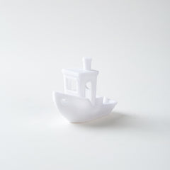 White ceramic boat on a white background