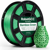 Spool of RobotGCC Bamboo Green 3D printing filament with a printed green vase.