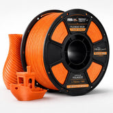 Spool of orange 3D printing filament with a small model boat on a white background