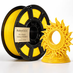 Spool of yellow 3D printing filament and a printed object on a white background
