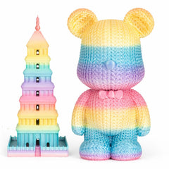 Colorful toy bear and tower on a white background