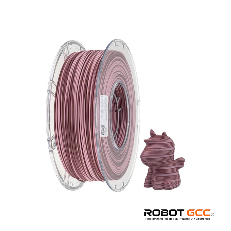 Spool of pink 3D printing filament with a printed object and Robot GCC logo on a white background