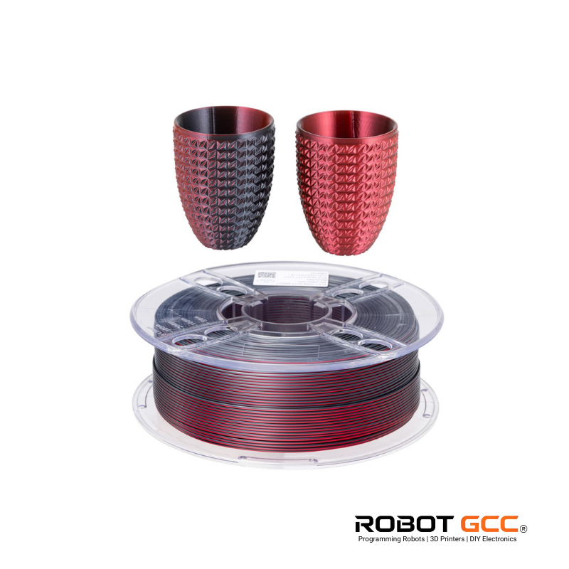 Two red and black textured cups with a spool of red and black filament on a white background, featuring the ROBOT GCC logo.