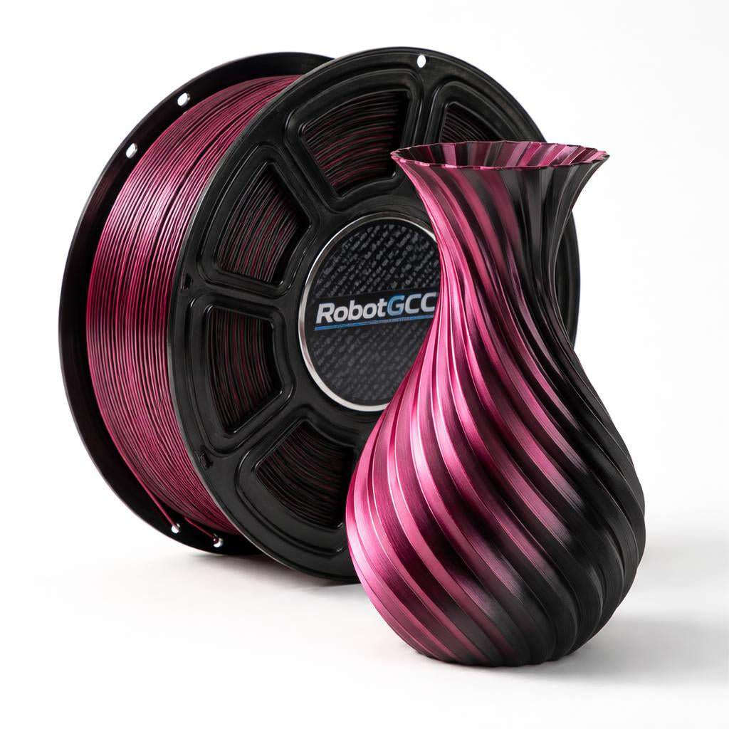 Spool of pink and black filament with a 3D printed vase on a white background, featuring the RobotGCC brand.