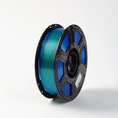Spool of blue filament on a white background