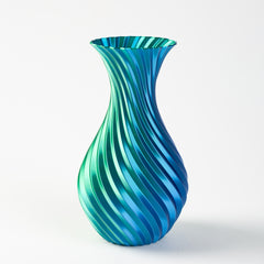 Blue and green striped vase on a white background