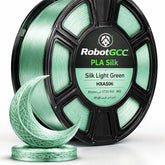 Spool of RobotGCC PLA Silk filament in Silk Light Green on a white background