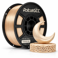 Spool of RobotGCC 3D printing filament with a printed crescent moon sculpture.