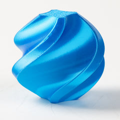 Blue textured object on a white background