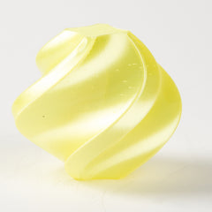 Yellow plastic component on a white background