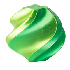 Green metal tool bit on a white background