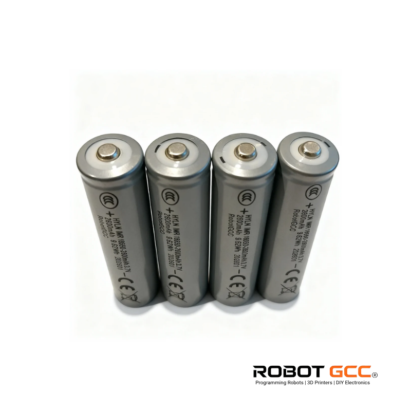 Four silver batteries with visible branding on a white background