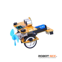 Electronic component board with motors, sensors, and a fan on a white background