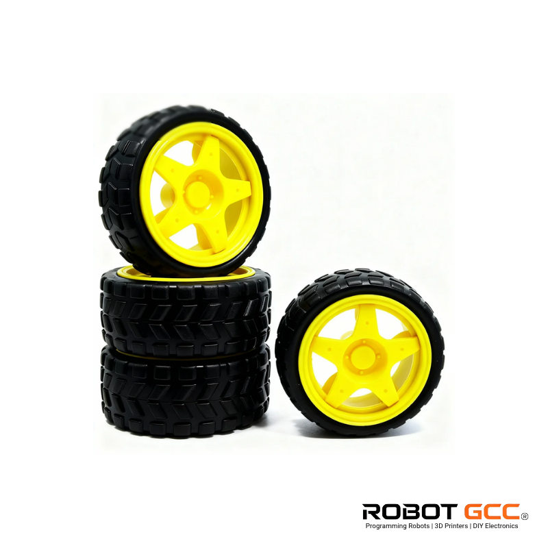 Four black tires with yellow wheels on a white background, featuring the ROBOT GCC logo.