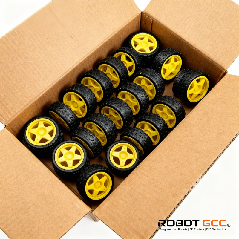 Box of robot wheels with yellow and black design, featuring ROBOT GCC logo.
