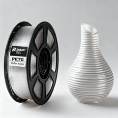 Spool of PETG filament and a white ribbed vase on a gray background