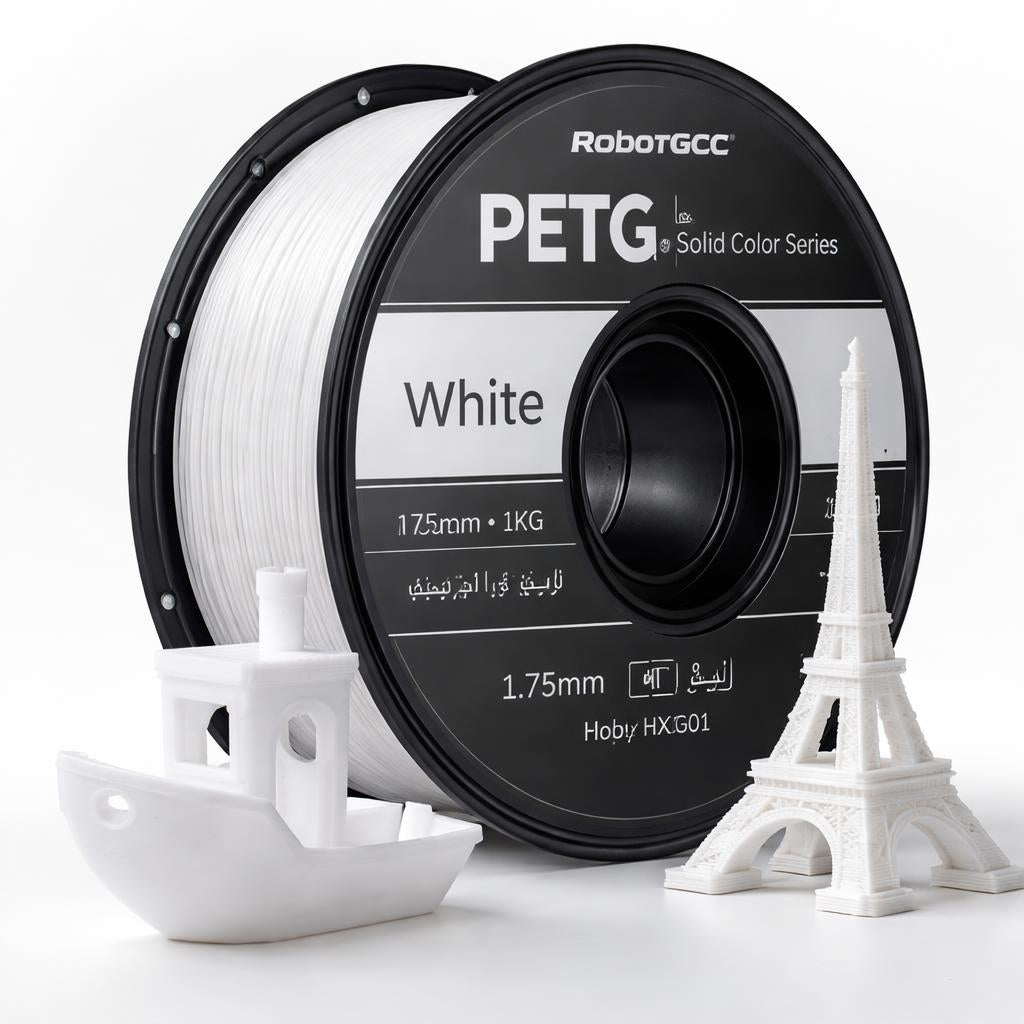Spool of white 3D printing filament with a small model structure on a white background