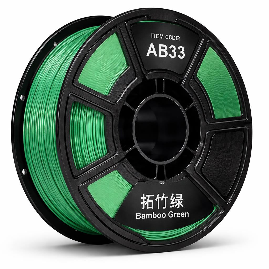 Spool of green filament with 'AB33' label on a white background