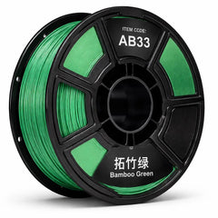Spool of green filament with 'AB33' label on a white background