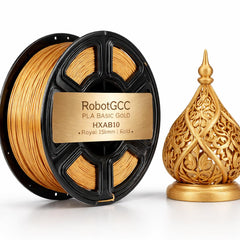 Spool of gold 3D printing filament with a decorative gold object on a white background