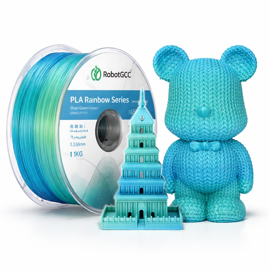 Spool of blue filament with a knitted bear and model building on a white background