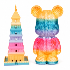 Colorful toy bear and tower on a white background