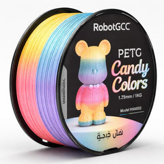Spool of RobotGCC PETG candy colors filament with a colorful 3D printed bear model on a white background