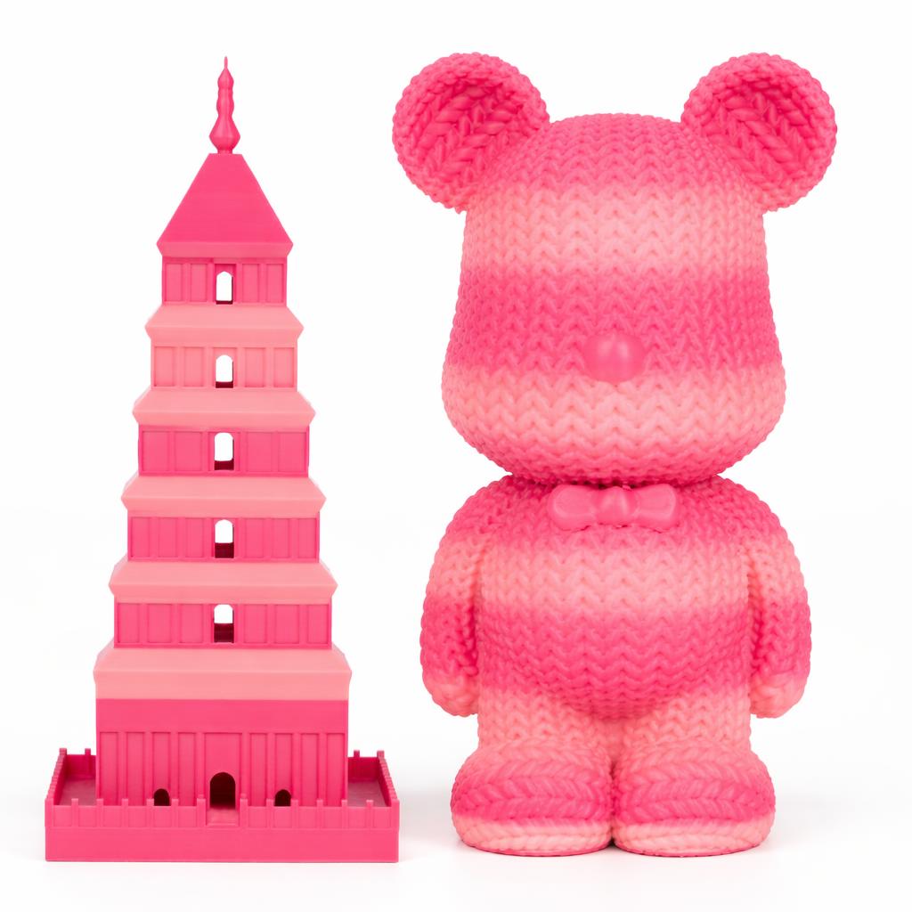 Pink toy bear and pink tower model on a white background