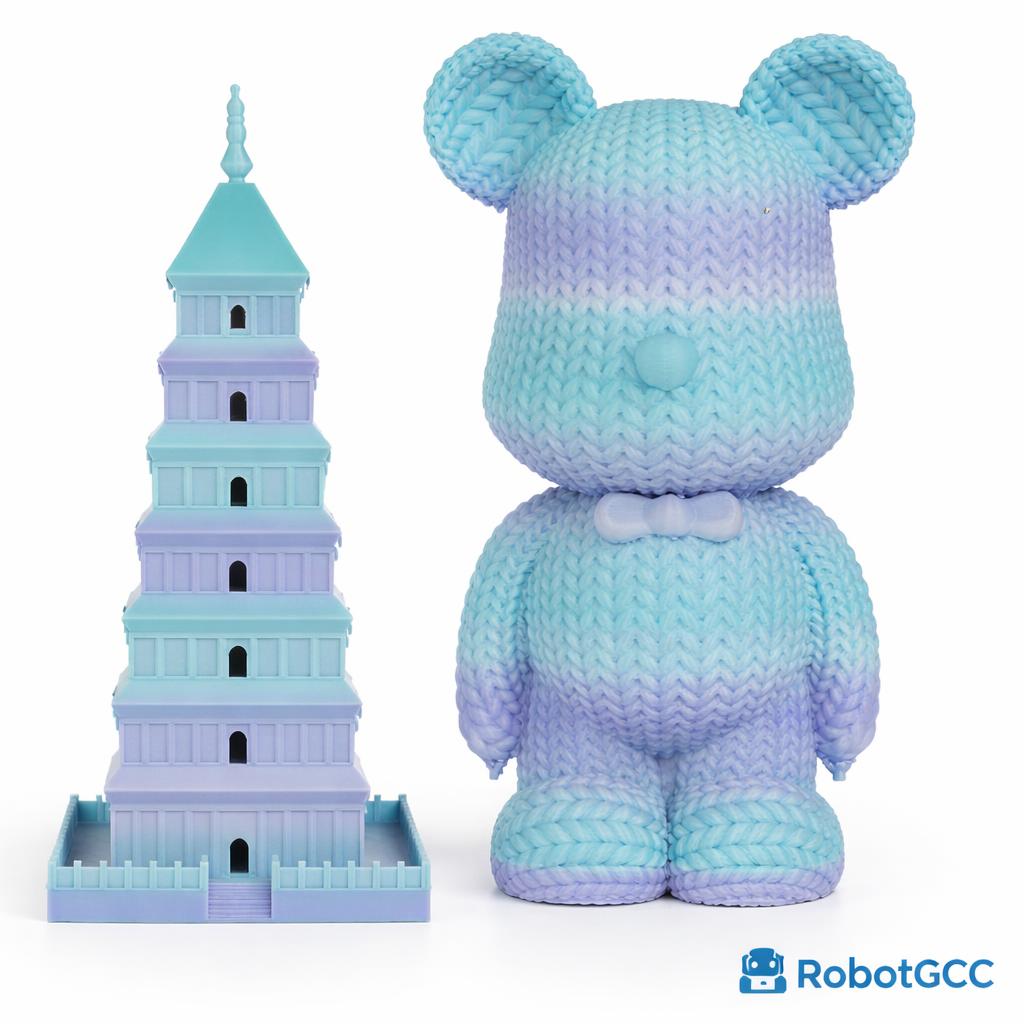 Crocheted bear and tower toy with gradient blue and purple colors on a white background.