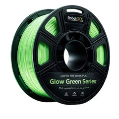 Spool of glow-in-the-dark green 3D printing filament with 'RobotGCC' branding on a dark background.