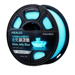 Spool of glow-in-the-dark blue filament with 'RobotGCC' branding on a dark background
