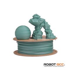 Spool of green 3D printing filament with a small 3D printed object on a white background, featuring the ROBOT GCC logo.
