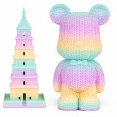 Colorful teddy bear and tower toy on a white background