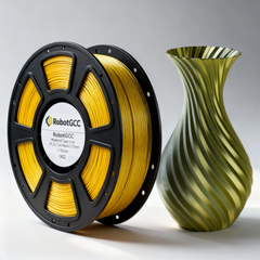 Spool of yellow 3D printing filament next to a green and gold 3D printed vase on a white background