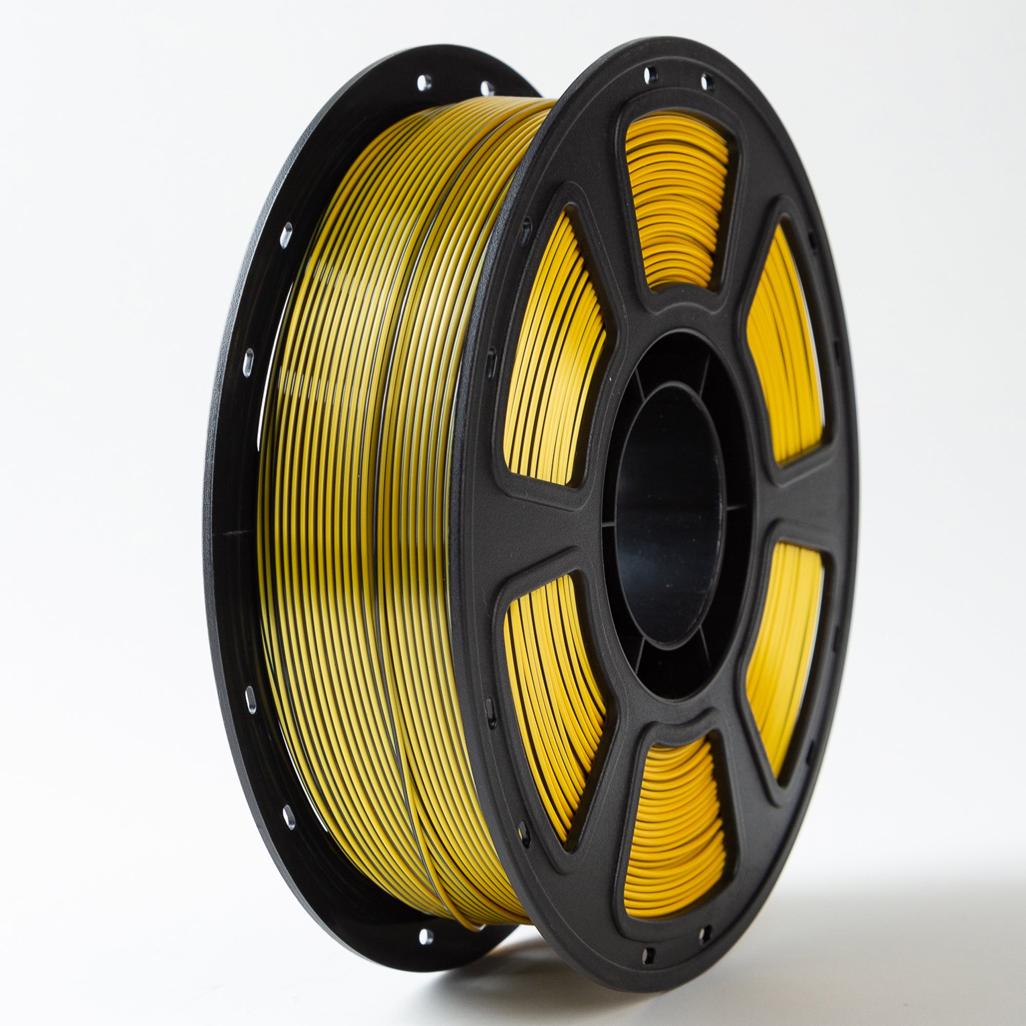 Spool of yellow filament on a white background