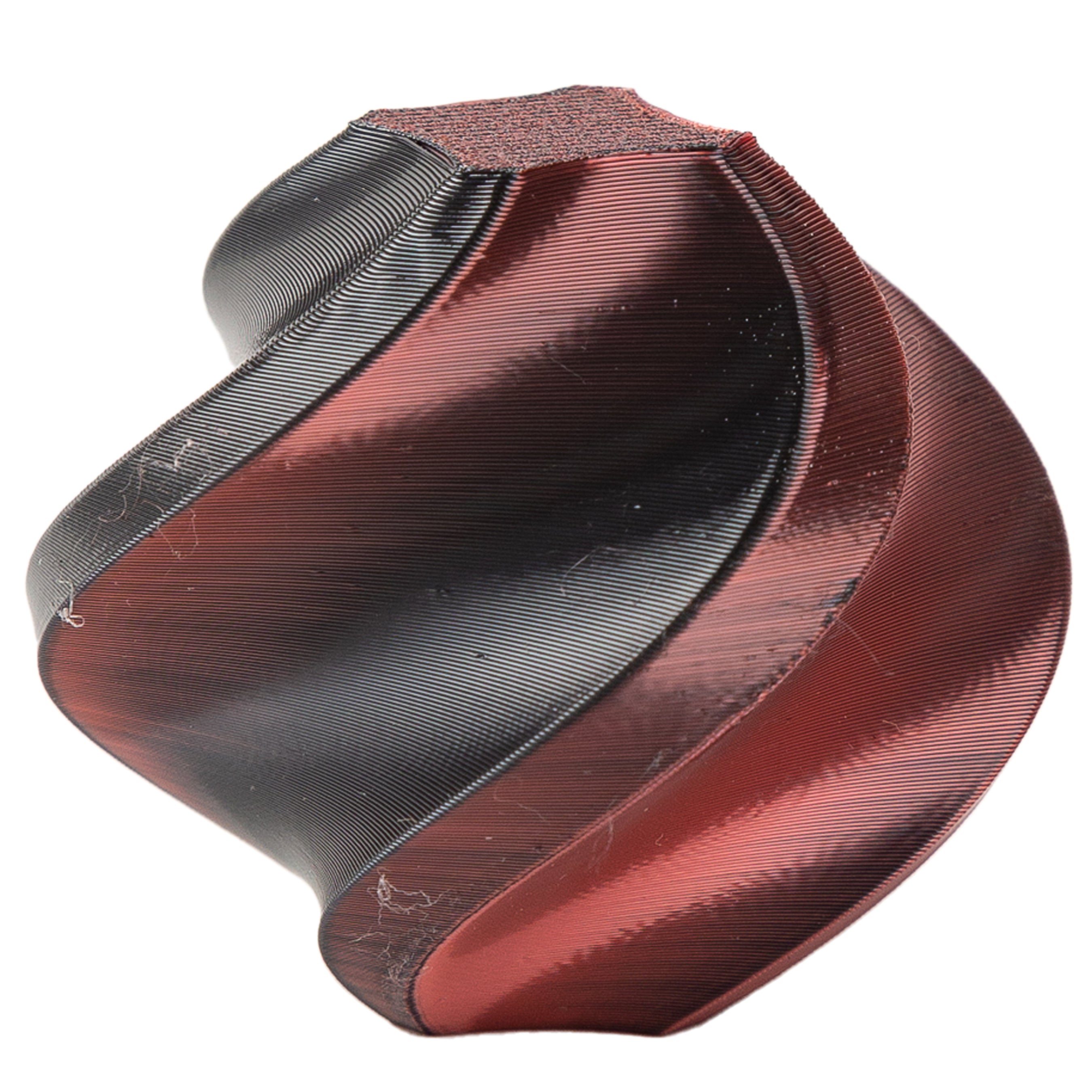 Red and black geometric object on a white background