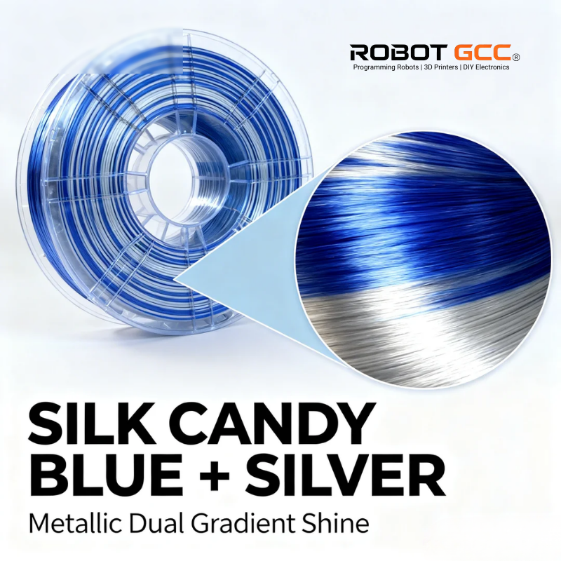 Spool of silk candy blue and silver metallic filament with Robot GCC branding.