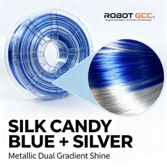Spool of silk candy blue and silver metallic filament with Robot GCC branding.