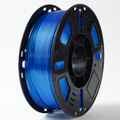 Spool of blue filament on a black spool with a white background