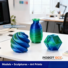 Three colorful 3D-printed models on a desk with a blurred office background.