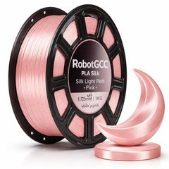 Spool of pink filament with 'RobotGCC' branding and a pink decorative item on a white background