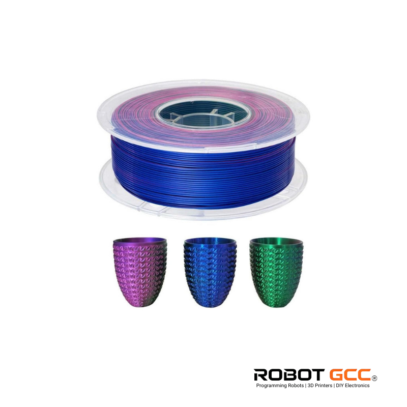 Spool of multicolored filament with three sample items on a white background, featuring the brand 'Robot GCC'.